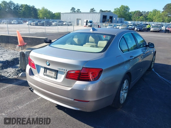 2013 BMW 5 Series 528i with VIN WBAXG5C51DD233122, listed as a IAAI auction lot 42161809 with 70,242 mi miles and . Bid and sale history available at DreamBid. Image 4.
