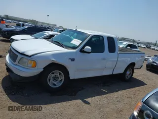 2000 Ford F-150 XL with VIN 1FTRX17L2YNA03263, listed as a IAAI auction lot 42326528 with Not provided miles and . Bid and sale history available at DreamBid. Image 14.