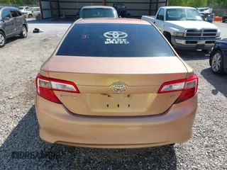 2012 Toyota Camry L with VIN 4T1BF1FKXCU030959, listed as a IAAI auction lot 42022501 with 304,524 mi miles. Bid and sale history available at carsss.com. Image 16.
