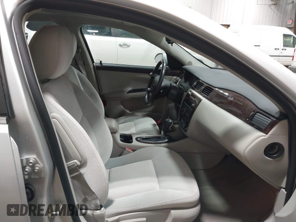 2014 Chevrolet Impala LT with VIN 2G1WB5E37E1178089, listed as a IAAI auction lot 42450127 with 58,277 mi miles and . Bid and sale history available at DreamBid. Image 5.