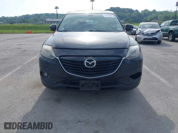 2015 Mazda CX-9 Grand Touring z VIN JM3TB2DA1F0456773, wystawiony jako IAAI lot #42257555 z przebiegiem 152 890 mil mil oraz . Historia ofert i sprzedaży dostępna na DreamBid. Obrazek 12.