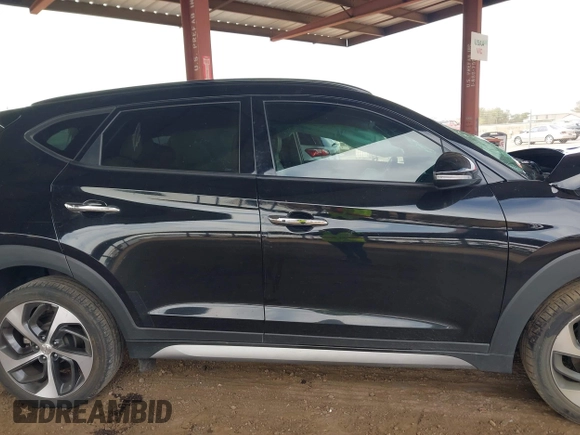 2017 Hyundai Tucson Value z VIN KM8J33A22HU316495, wystawiony jako IAAI lot #41896507 z przebiegiem 82 517 mil mil oraz . Historia ofert i sprzedaży dostępna na DreamBid. Obrazek 13.