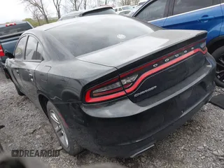 2015 Dodge Charger SE with VIN 2C3CDXBG7FH841469, listed as a IAAI auction lot 42001599 with 103,342 mi miles and . Bid and sale history available at DreamBid. Image 3.