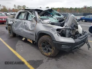 2021 Ram 1500 Rebel with VIN 1C6SRFLT0MN734774, listed as a IAAI auction lot 41075676 with 95,808 mi miles and . Bid and sale history available at DreamBid. Image 1.