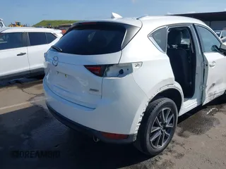 2017 Mazda CX-5 Grand Touring with VIN JM3KFADLXH0222341, listed as a IAAI auction lot 41990464 with 94,374 mi miles and . Bid and sale history available at carsss.com. Image 19.