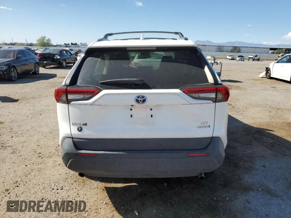 2021 Toyota RAV4 Hybrid LE with VIN 4T3LWRFVXMU044589, listed as a Copart auction lot 62431265 with 52,243 mi miles and Salvage title. Bid and sale history available at DreamBid. Image 6.
