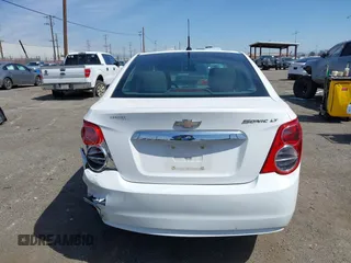 2014 Chevrolet Sonic LT with VIN 1G1JC5SH9E4212898, listed as a IAAI auction lot 41852112 with 121,382 mi miles and . Bid and sale history available at DreamBid. Image 16.