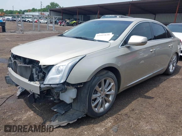 2014 Cadillac XTS Luxury z VIN 2G61M5S38E9291182, wystawiony jako IAAI lot #42495838 z przebiegiem 104 941 mil mil oraz . Historia ofert i sprzedaży dostępna na DreamBid. Obrazek 2.