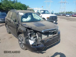 2018 Subaru Forester z VIN JF2SJABC6JH422894, wystawiony jako IAAI lot #42548743 z przebiegiem 66 628 mil mil oraz . Historia ofert i sprzedaży dostępna na DreamBid. Obrazek 6.