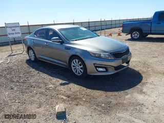 2015 Kia Optima LX with VIN 5XXGM4A77FG399907, listed as a IAAI auction lot 41780382 with 133,797 mi miles. Bid and sale history available at carsss.com. Image 1.