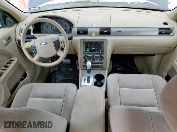 2005 Ford Five Hundred SE z VIN 1FAFP23135G175790, wystawiony jako Copart lot #56588085 z przebiegiem 117 354 mil mil oraz Szkody całkowita. Historia ofert i sprzedaży dostępna na DreamBid. Obrazek 8.