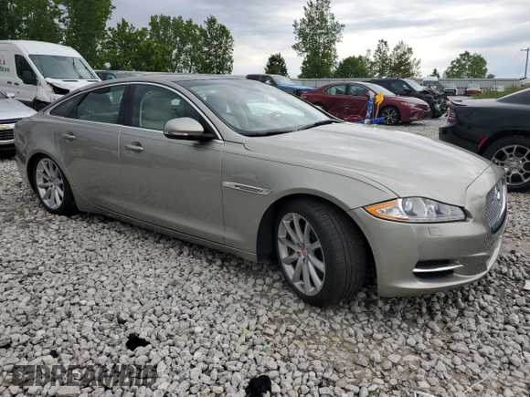 2014 Jaguar XJ z VIN SAJWJ1CD9E8V62338, wystawiony jako Copart lot #58924065 z przebiegiem 60 909 mil mil oraz Czysty tytuł • Clean title. Historia ofert i sprzedaży dostępna na DreamBid. Obrazek 4.