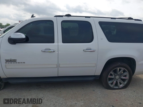 2011 Chevrolet Suburban LT with VIN 1GNSCJE05BR392834, listed as a IAAI auction lot 42141087 with 251,359 mi miles and . Bid and sale history available at DreamBid. Image 14.
