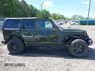 2024 Jeep Wrangler Willys with VIN 1C4PJXDG8RW236725, listed as a IAAI auction lot 39128397 with 50 mi miles and . Bid and sale history available at DreamBid. Image 14.