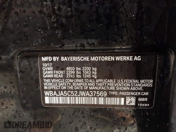 2018 BMW 5 Series 530i with VIN WBAJA5C52JWA37569, listed as a IAAI auction lot 41240799 with 80,116 mi miles and . Bid and sale history available at DreamBid. Image 9.