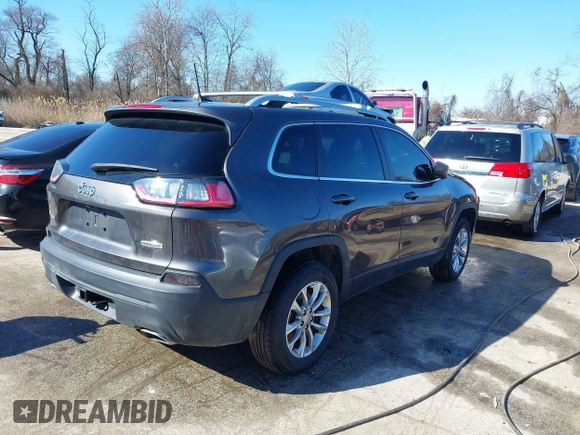 2019 Jeep Cherokee Altitude with VIN 1C4PJMLN7KD194094, listed as a IAAI auction lot 41547315 with 74,123 mi miles. Bid and sale history available at carsss.com. Image 4.
