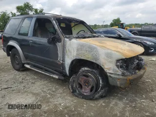1998 Ford Explorer Sport with VIN 1FMYU24E2WUA90614, listed as a Copart auction lot 56925915 with Not provided miles and Salvage title. Bid and sale history available at DreamBid. Image 4.