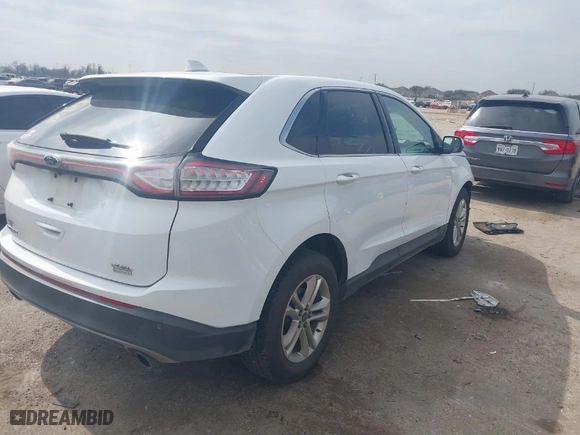 2015 Ford Edge SEL with VIN 2FMTK3J91FBC17694, listed as a IAAI auction lot 41542874 with 170312 miles. Bid and sale history available at carsss.com. Image 4.