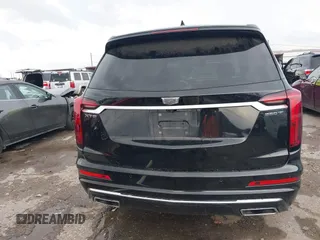 2023 Cadillac XT6 FWD Luxury z VIN 1GYKPAR43PZ147512, wystawiony jako IAAI lot #42175720 z przebiegiem 31 520 mil mil oraz . Historia ofert i sprzedaży dostępna na DreamBid. Obrazek 17.