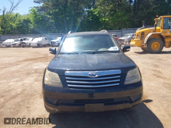 2009 Kia Borrego LX with VIN KNDJJ741395033538, listed as a IAAI auction lot 42088382 with 119,225 mi miles. Bid and sale history available at carsss.com. Image 6.