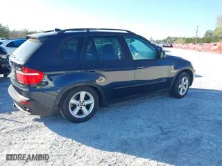 2007 BMW X5 3.0si with VIN 5UXFE43587L018974, listed as a IAAI auction lot 41842712 with 1 mi miles. Bid and sale history available at carsss.com. Image 4.