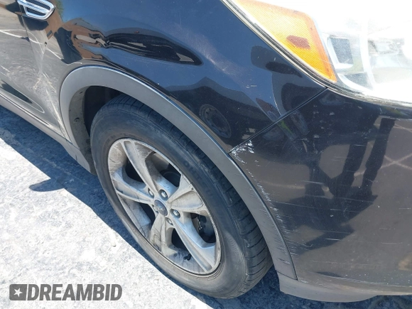 2013 Ford Escape SE z VIN 1FMCU0GX5DUA13261, wystawiony jako IAAI lot #42548111 z przebiegiem 183 037 mil mil oraz . Historia ofert i sprzedaży dostępna na DreamBid. Obrazek 6.