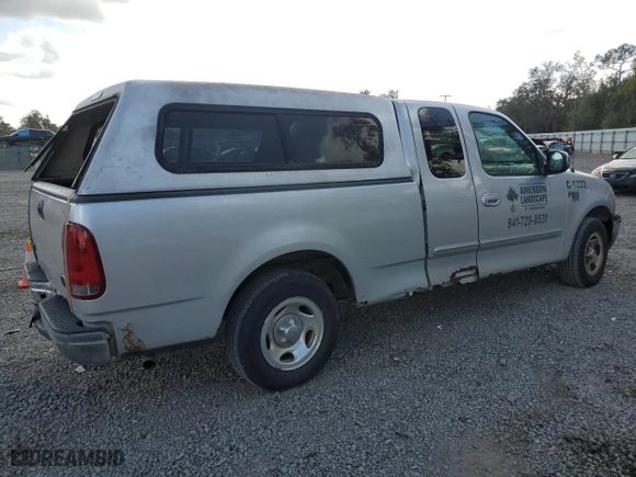 2001 Ford F-150 Work Series with VIN 2FTRX17W21CA26757, listed as a Copart auction lot 79602654 with 0 mi miles and Non Repairable. Bid and sale history available at carsss.com. Image 3.