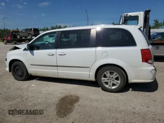 2017 Dodge Grand Caravan Crew Plus with VIN 2C4RDGDG6HR765484, listed as a Copart auction lot 63389874 with 169,529 mi miles and Salvage Title. Bid and sale history available at DreamBid. Image 2.