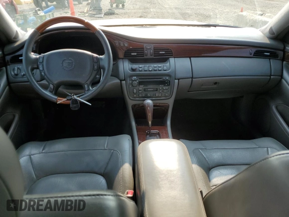 2004 Cadillac DeVille DTS z VIN 1G6KF57984U188454, wystawiony jako Copart lot #62397494 z przebiegiem 142 060 mil mil oraz Szkoda całkowita • Salvage title. Historia ofert i sprzedaży dostępna na DreamBid. Obrazek 8.