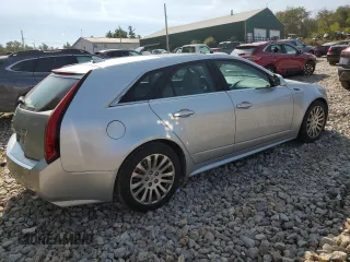 2010 Cadillac CTS Performance z VIN 1G6DM8EG9A0126811, wystawiony jako Copart lot #71155534 z przebiegiem 146 947 mil mil oraz Szkoda całkowita • Salvage title. Historia ofert i sprzedaży dostępna na DreamBid. Obrazek 3.