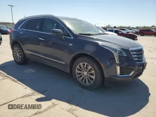 2019 Cadillac XT5 Luxury FWD with VIN 1GYKNCRS1KZ131818, listed as a Copart auction lot 49354595 with 131,995 mi miles and Salvage Title. Bid and sale history available at DreamBid. Image 4.