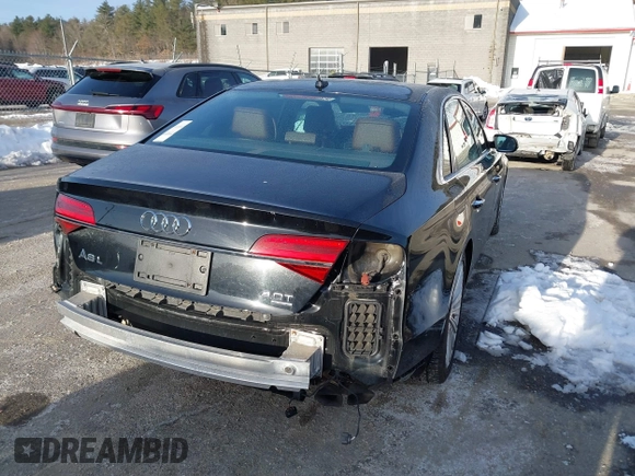 2015 Audi A8 L 4.0T with VIN WAU32AFD0FN035282, listed as a IAAI auction lot 41515136 with 76,518 mi miles. Bid and sale history available at carsss.com. Image 4.