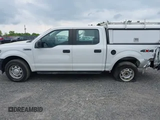 2019 Ford F-150 XL with VIN 1FTEW1EB0KFB01334, listed as a IAAI auction lot 42090740 with 79,881 mi miles and . Bid and sale history available at DreamBid. Image 14.