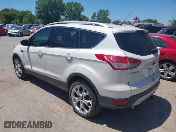 2013 Ford Escape Titanium with VIN 1FMCU9J94DUD32777, listed as a IAAI auction lot 42683798 with 197,857 mi miles and . Bid and sale history available at DreamBid. Image 3.