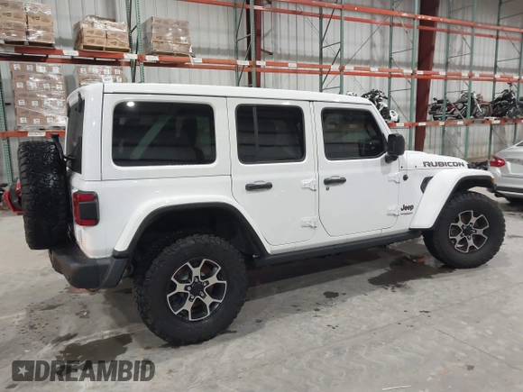2021 Jeep Wrangler Unlimited Rubicon with VIN 1C4HJXFN2MW809904, listed as a IAAI auction lot 41567956 with 34,000 mi miles and . Bid and sale history available at DreamBid. Image 13.