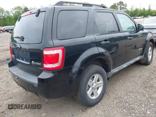 2009 Ford Escape Hybrid with VIN 1FMCU59369KB61445, listed as a IAAI auction lot 42377759 with Not provided miles and . Bid and sale history available at DreamBid. Image 4.