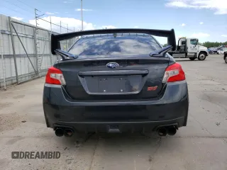 2015 Subaru WRX STI z VIN JF1VA2P63F9817840, wystawiony jako Copart lot #58302783 z przebiegiem 48 456 mil mil oraz . Historia ofert i sprzedaży dostępna na DreamBid. Obrazek 6.