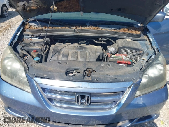 2005 Honda Odyssey EX with VIN 5FNRL38465B059893, listed as a IAAI auction lot 42790058 with 257,143 mi miles and . Bid and sale history available at DreamBid. Image 10.