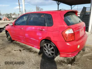 2005 Kia Spectra with VIN KNAFE162255129620, listed as a Copart auction lot 86822464 with 249,516 mi miles and Salvage Title. Bid and sale history available at carsss.com. Image 2.