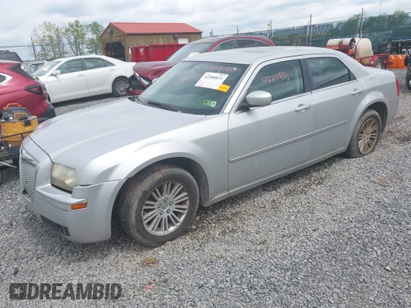 2008 Chrysler 300 Touring with VIN 2C3KA53G48H309834, listed as a IAAI auction lot 42200833 with 209,198 mi miles. Bid and sale history available at carsss.com. Image 2.