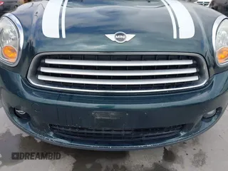 2012 MINI Countryman with VIN WMWZB3C54CWM01897, listed as a IAAI auction lot 42083668 with 132,417 mi miles and . Bid and sale history available at DreamBid. Image 6.