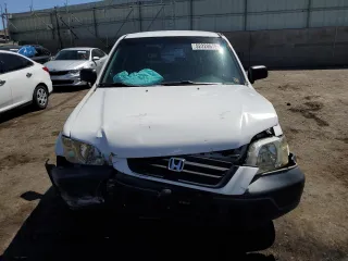 1999 Honda CR-V LX with VIN JHLRD2847XC019705, listed as a Copart auction lot 52220675 with 236,219 mi miles and Salvage Title. Bid and sale history available at carsss.com. Image 5.