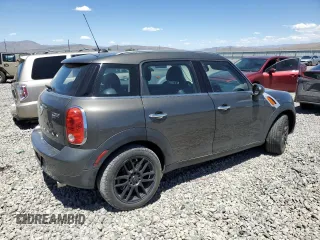 2014 MINI Countryman with VIN WMWZB3C56EWR38919, listed as a Copart auction lot 61385865 with 127,368 mi miles and Salvage title. Bid and sale history available at DreamBid. Image 3.