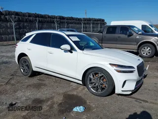 2022 Genesis GV70 2.5T with VIN KMUMADTB5NU051297, listed as a IAAI auction lot 41892642 with 46,421 mi miles and . Bid and sale history available at DreamBid. Image 1.