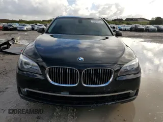 2011 BMW 7 Series 740i with VIN WBAKA4C59BC392351, listed as a Copart auction lot 84942304 with 76,874 mi miles and Salvage Title. Bid and sale history available at carsss.com. Image 5.