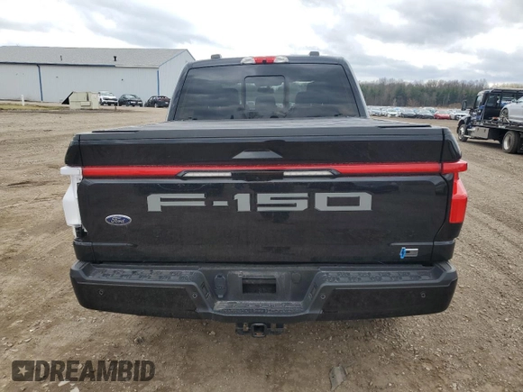 2022 Ford F-150 Lightning Pro z VIN 1FTVW1EL6NWG15167, wystawiony jako Copart lot #50514135 z przebiegiem 18 912 mil mil oraz Szkody całkowita. Historia ofert i sprzedaży dostępna na DreamBid. Obrazek 6.