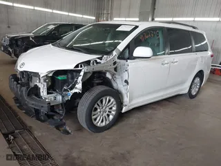 2012 Toyota Sienna XLE AAS with VIN 5TDYK3DC2CS196897, listed as a IAAI auction lot 41762345 with 183,188 mi miles. Bid and sale history available at carsss.com. Image 18.