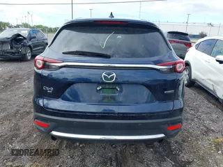 2021 Mazda CX-9 Grand Touring with VIN JM3TCBDY3M0537975, listed as a IAAI auction lot 42251894 with 50,156 mi miles and . Bid and sale history available at DreamBid. Image 16.