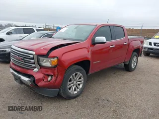 2015 GMC Canyon 2WD SLT with VIN 1GTG5CE3XF1211164, listed as a IAAI auction lot 41490387 with 163,932 mi miles. Bid and sale history available at carsss.com. Image 17.