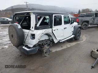 2021 Jeep Wrangler Unlimited Sport Altitude with VIN 1C4HJXDG2MW791599, listed as a IAAI auction lot 41235427 with 47,220 mi miles and . Bid and sale history available at DreamBid. Image 4.